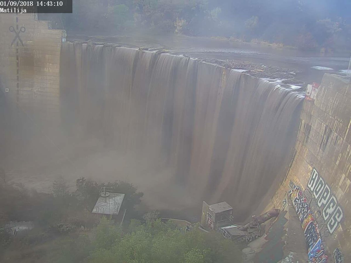 Water and debris flowing over the old Matilija Dam. Ojai 