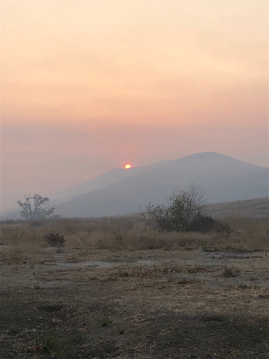 The sun is rising over Agoura Hills, where the fire has calmed. But the air is still filled with smoke.   