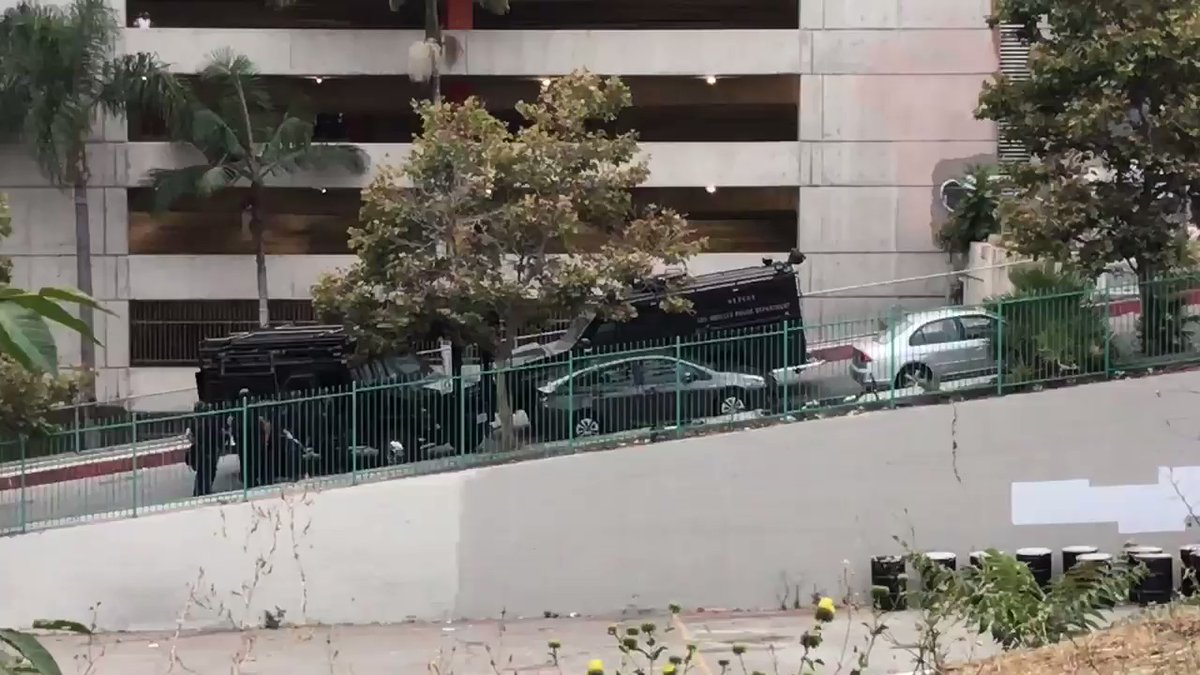 A SWAT team in downtown Los Angeles was involved in an hourslong standoff Tuesday morning after police located a car connected to a woman's abduction in Monrovia, authorities said.