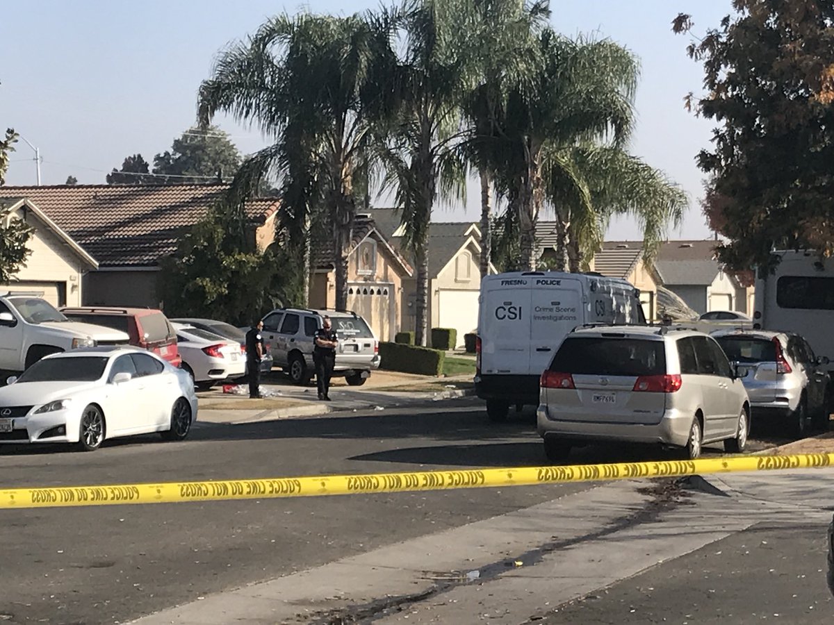 Scene of the backyard shooting in Fresno off of Cesar Avenue and Lamona Avenue where police are still lining the neighborhood trying to figure out what happened last night. They say 10 people were shot and 4 were killed at a backyard football party.