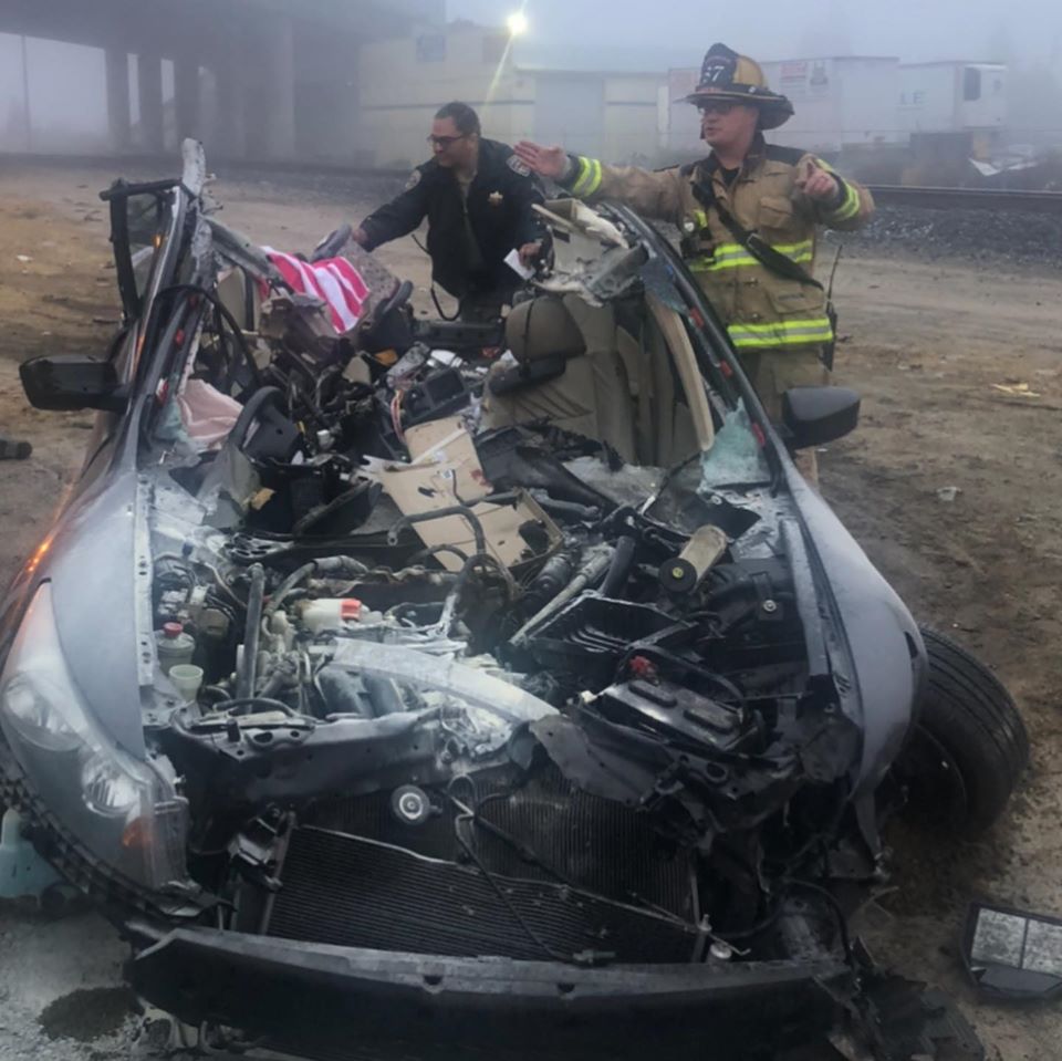 The California Highway Patrol says a driver is lucky to be alive after his car crashed into a big rig.