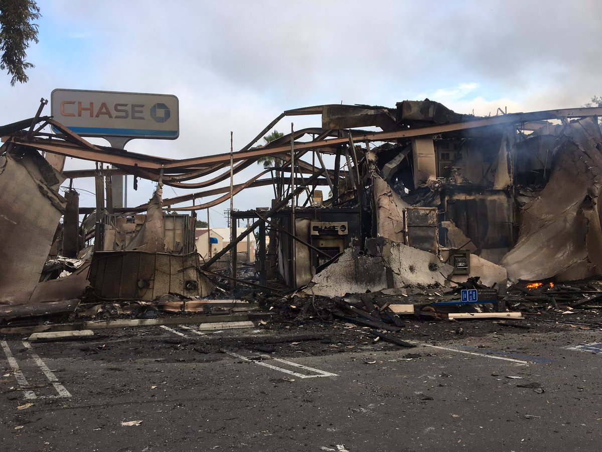 Waking to the charred ruins of Chase Bank & Union Bank in LaMesa.  Looters set the Spring Street banks on fire Saturday night. Flames were still feeding on the buildings Sunday morning  