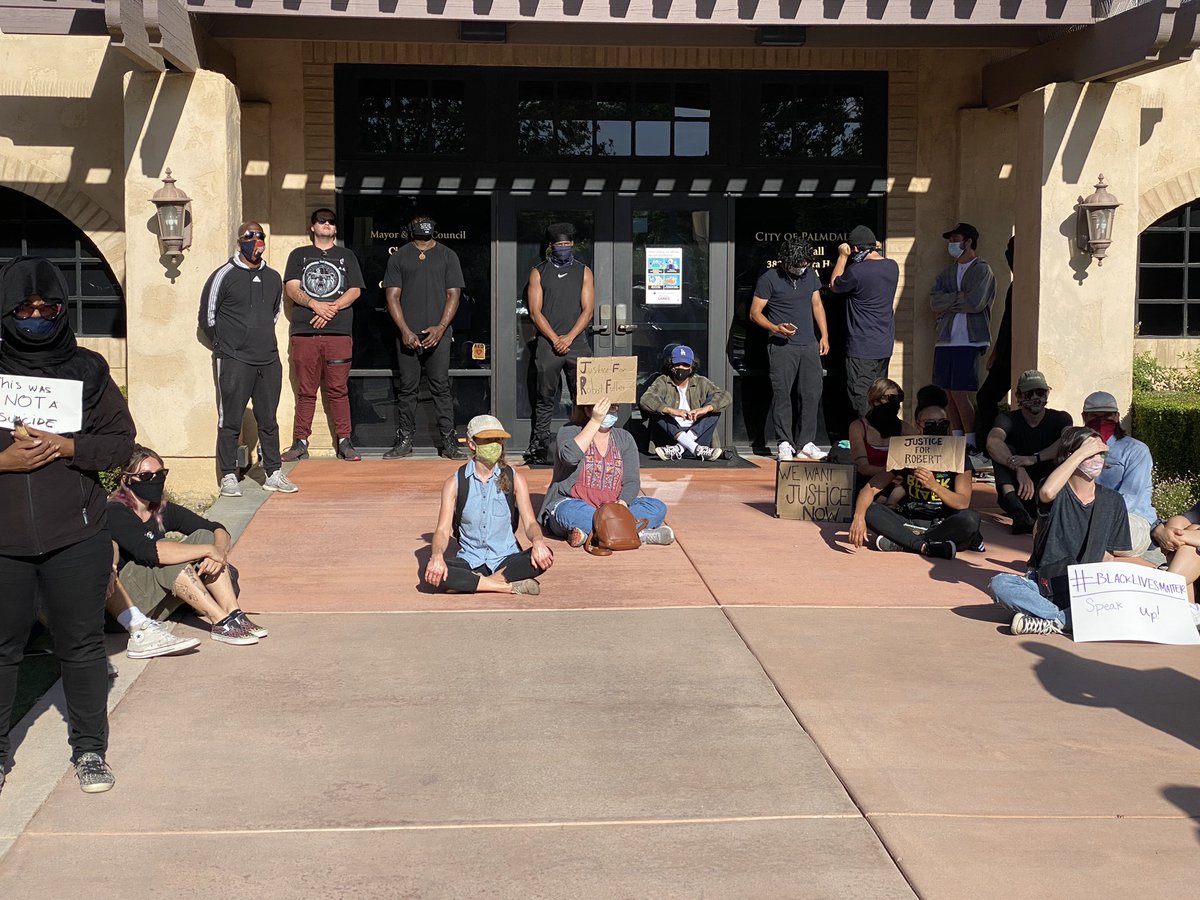 Demonstration outside Palmdale City Hall this morning as activists hold sit-in, blocking access to building. They're demanding answers in the hanging death of Robert Fuller, currently ruled a suicide