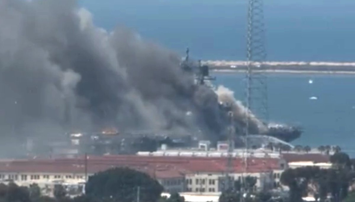 More views of the fire burning   on board US Navy amphibious ship USS BONHOMME RICHARD LHD6 at 32nd Street Naval Station in San Diego. Reports so far indicate 3 sailors, 1 SDFD fireman injured. At the moment the fire seems to be growing