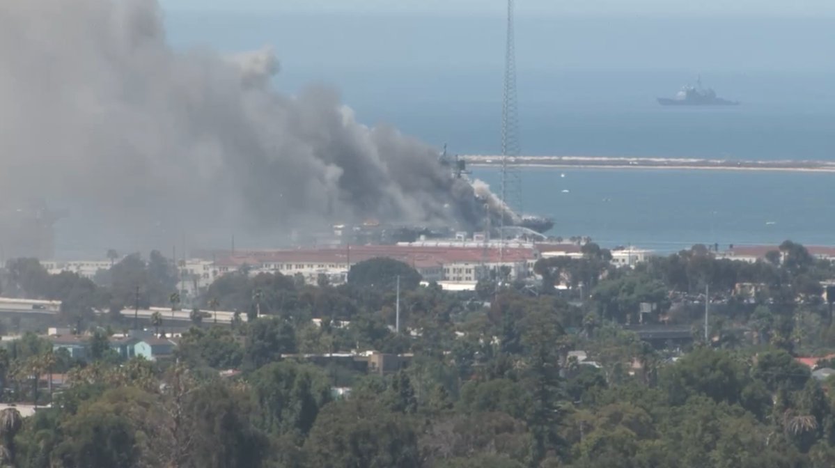 More views of the fire burning   on board US Navy amphibious ship USS BONHOMME RICHARD LHD6 at 32nd Street Naval Station in San Diego. Reports so far indicate 3 sailors, 1 SDFD fireman injured. At the moment the fire seems to be growing