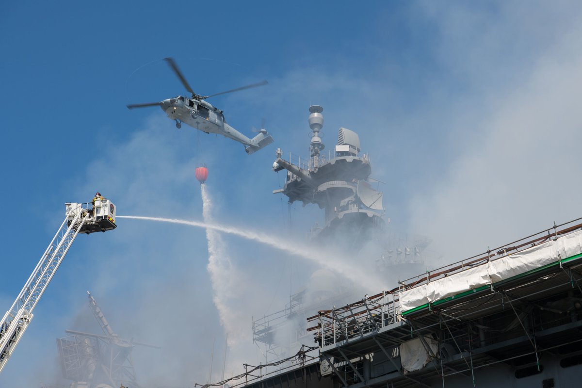 More imagery from the continuing fight to save burning USS BONHOMME RICHARD LHD6 at San Diego Naval Base. Firefighting efforts by more than 400 Navy sailors and civilian firefighters continued throughout Monday 13 July but the Navy has yet to declare the fire out