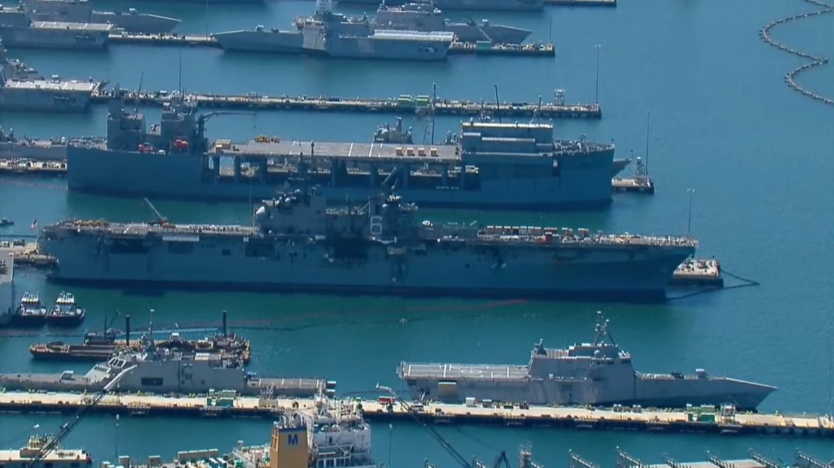 Pictures from CBS8 San Diego of USS BONHOMME RICHARD LHD6 at Naval Base San Diego, seen around 11 AM PDT. The fire has   been declared out. News conference upcoming in about 10 minutes at