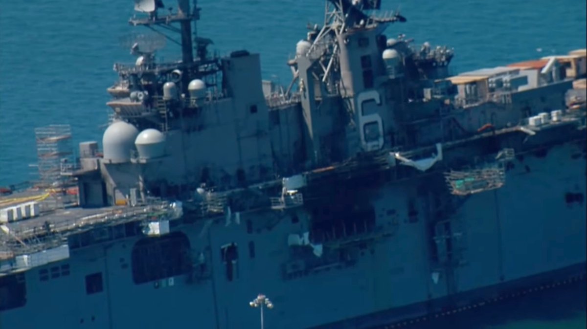 Pictures from CBS8 San Diego of USS BONHOMME RICHARD LHD6 at Naval Base San Diego, seen around 11 AM PDT. The fire has   been declared out. News conference upcoming in about 10 minutes at