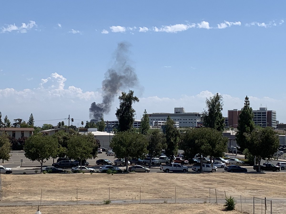 Fresno Fire on scene of another fire in a homeless encampment along the highway, homeless involved fires are still up over 70 percent this year