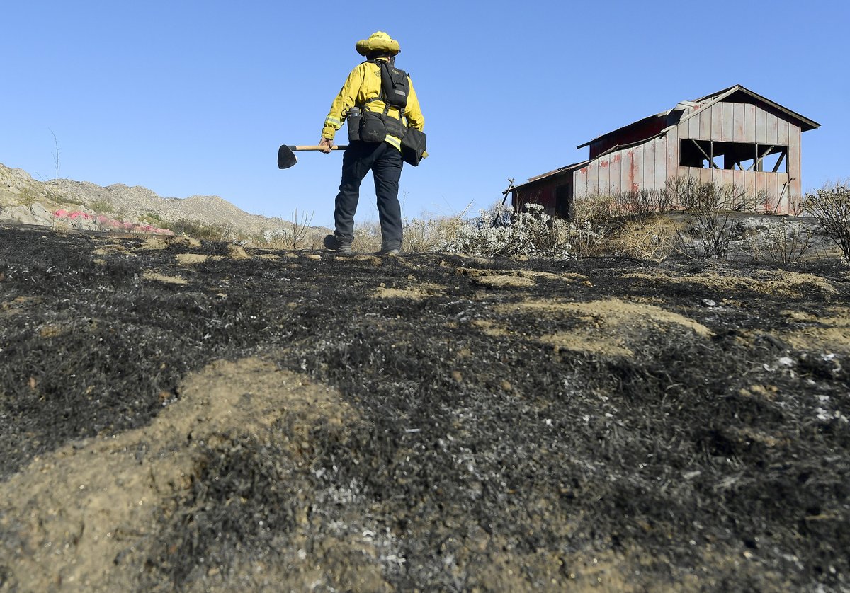 Firefighters put out hot spots from the #cerritosfire near #hemet Thursday morning. The fire has burned approximately 200 acres.