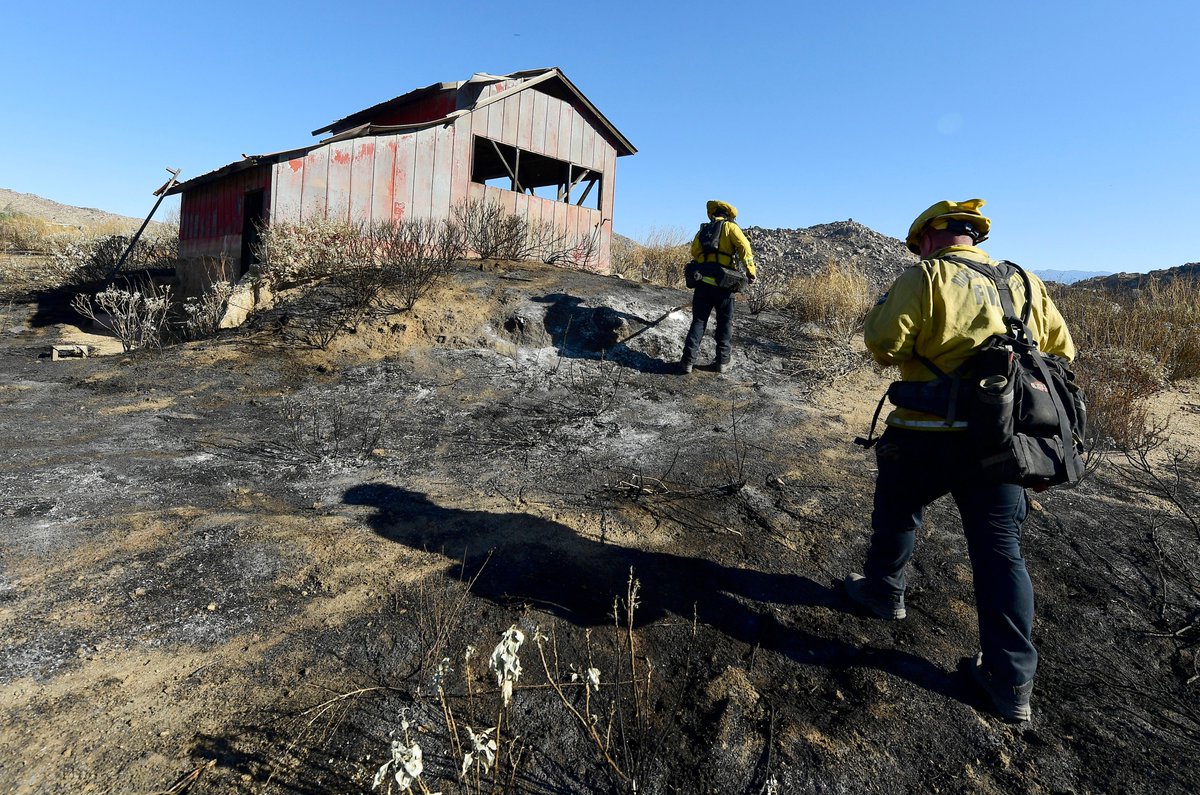 Firefighters put out hot spots from the #cerritosfire near #hemet Thursday morning. The fire has burned approximately 200 acres.