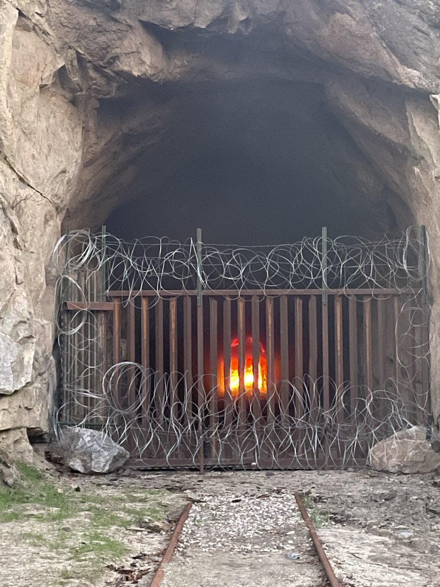 .@CALFIRESANDIEGO is at scene with Border Patrol of a fire in an inactive cross-border railway tunnel in Bell Valley. Heavy fire in tunnel structural components but no spread to surrounding vegetation. Firefighters will remain at scene overnight