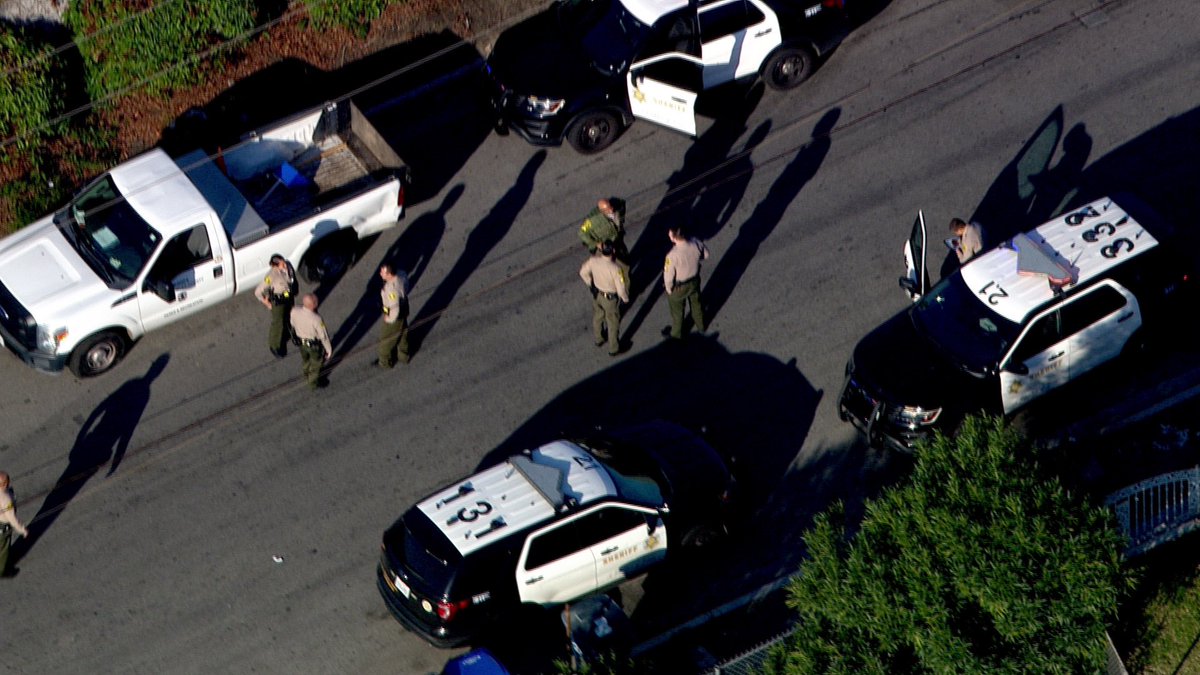 South Gate Century Deputies Pursuit Ending 1 in custody but only after a short pursuit with  attempts at spike stripping the suspect. The white truck the suspect vehicle that pulled over & then the suspect tried to walk away Deputies took him into custody alameda &amp; Nebraska 