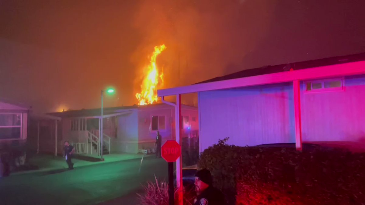 Early this morning your OCFA firefighters made quick work of a fire in Santa Ana.  The fire involving multiple cypress trees and one mobile home was imminently threatening other homes.  Fortunately, thanks to a well coordinated fire attack the adjacent homes were saved