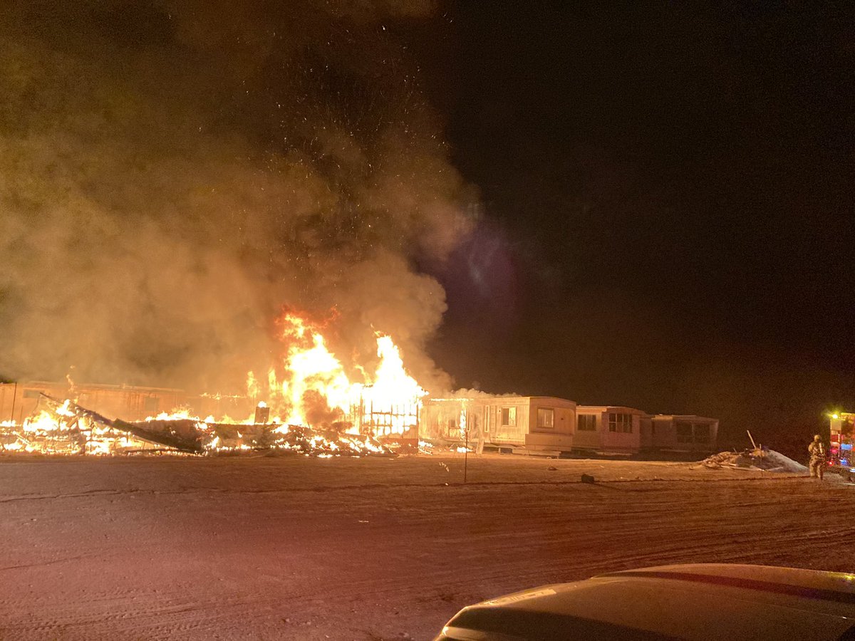 There is a total of 7 abandoned mobile homes on fire, along with various debris. Firefighters are still anticipated to remain on scene for 3-4 hours