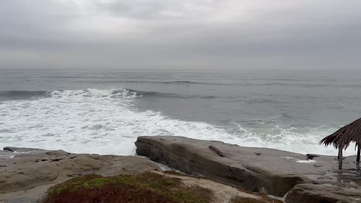 7:50am at Windansea - the beach is taken over by water but it's mainly because of high surf and high tide. So it's hard to tell any impacts of a tsunami wave at this beach except the overall high levels of water. There are a lot of people here watching, they likely got the alert