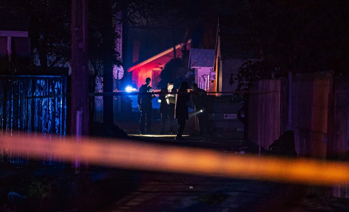 Fresno police investigate a homicide in a Tower District alley after an officer found a man shot multiple times near Van Ness and Belmont Avenues