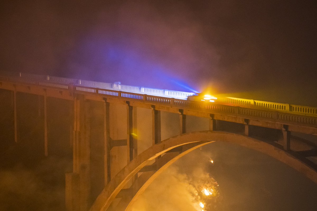 The ColoradoFire burns below Rocky Creek Bridge on Highway 1 near BigSur California on Friday, Jan. 21, 2022.