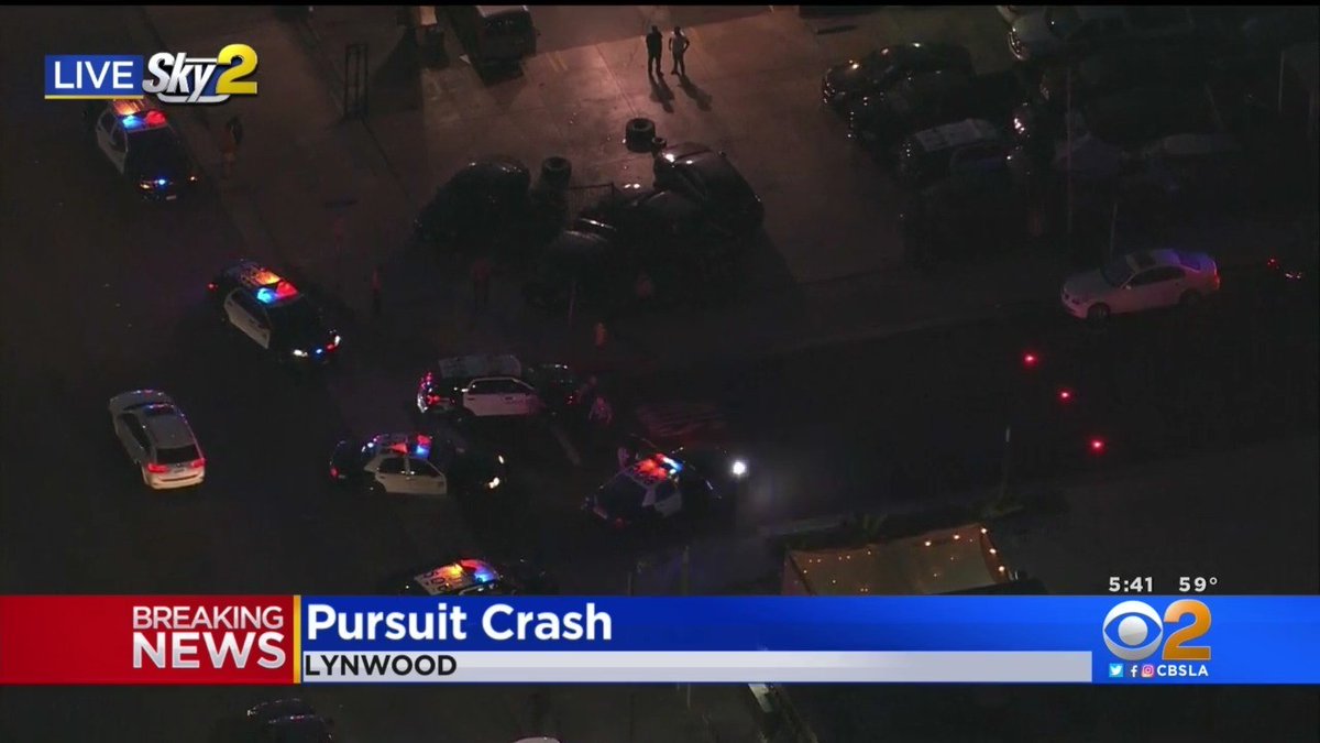 Sheriff's deputies took five people into custody after they bailed out of a black Dodge Cavalier that led authorities on a pursuit that ended in a crash. An ambulance was called to the scene