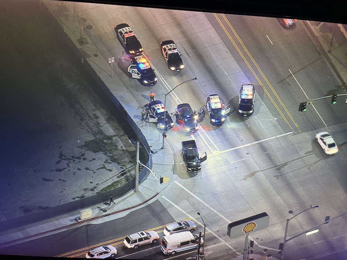 End of a stolen car pursuit in South Gate. Suspect tried to pull a fast one and take off after initially being pulled over but deputies were able to spike two tires. After a minor crash, the driver continued for a bit  but decided to give up. Two ladies in custody 