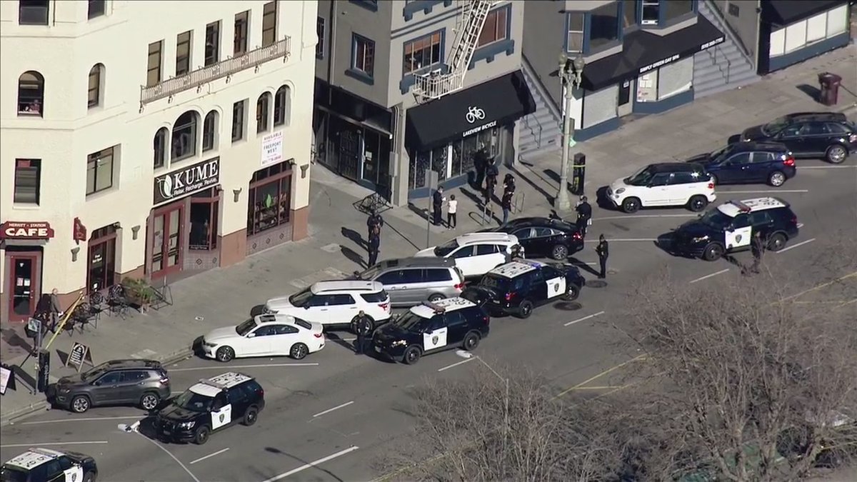 Oakland police were outside of a spa near Lake Merritt where two people were shot Tuesday morning