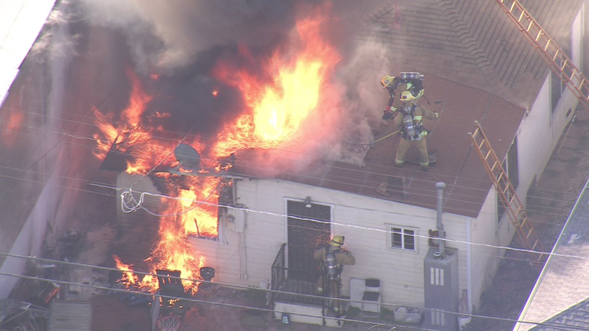 City of Vernon 1800 42nd st small residential next to a commercial heavy fire in the home when firefighters arrived. @LAFD aggressively attacked the fire and saved some of the property and kept the flames from spreading. No injuries