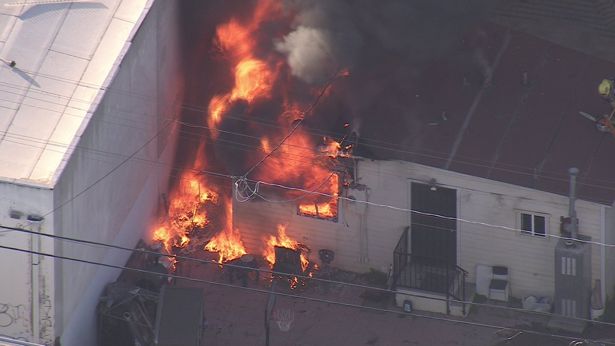 City of Vernon 1800 42nd st small residential next to a commercial heavy fire in the home when firefighters arrived. @LAFD aggressively attacked the fire and saved some of the property and kept the flames from spreading. No injuries  