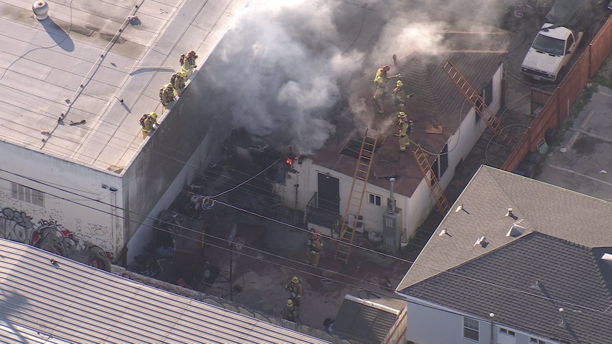 City of Vernon 1800 42nd st small residential next to a commercial heavy fire in the home when firefighters arrived. @LAFD aggressively attacked the fire and saved some of the property and kept the flames from spreading. No injuries  