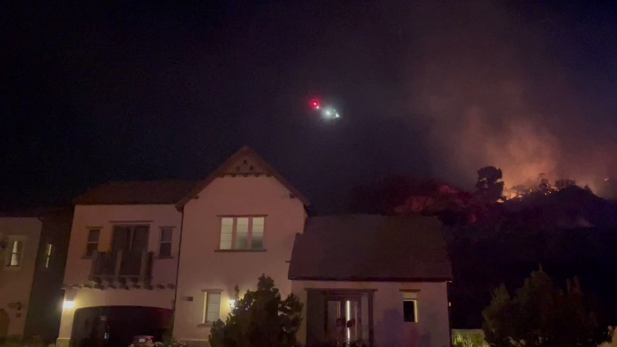 A brush fire is burning in the hills above the Rosedale community in Azusa. @LACOFD is battling the blaze