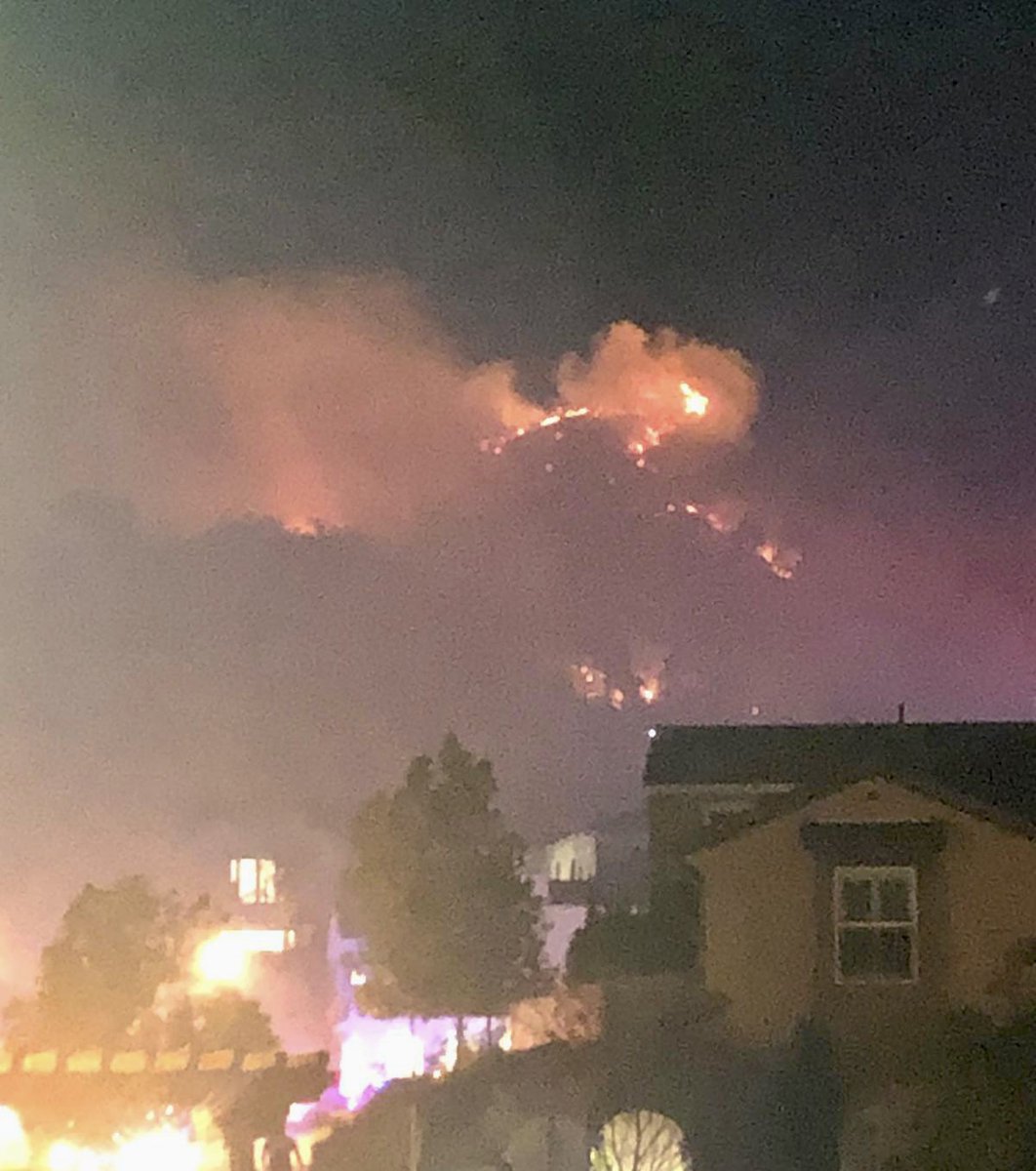 Two @LACoFireAirOps water dropping helicopters are using night vision technology to assist @LACoFD @Angeles_NF with a small wildfire in the mountains above Azusa, CA