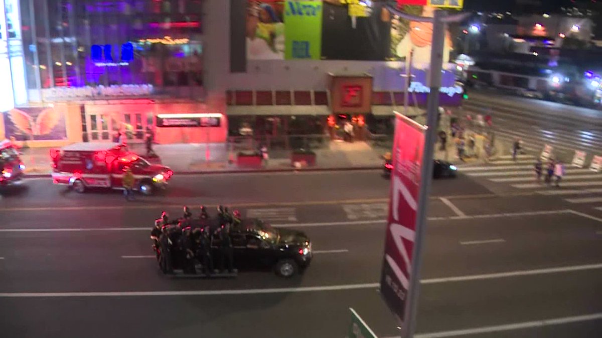 LAPD has declared an unlawful assembly in downtown after Super Bowl celebrations became too rowdy. Officers can be seen rolling around on the sides of SUVs near L.A. Live