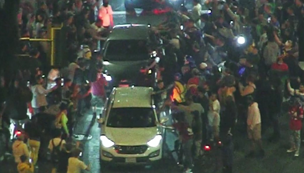 DTLA 12th and Grand.  Crowds are starting to shake cars.