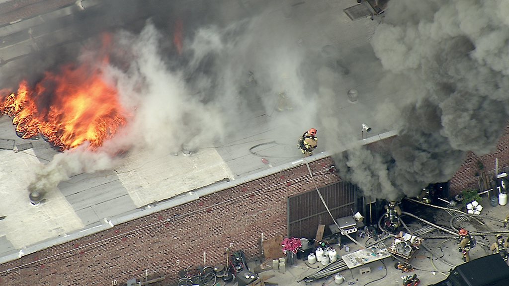 Downtown Los Angeles 7th & Ceres commercial structure fire @LAFD battling flames and working to save property right now no injuries but the fire fight still on going 