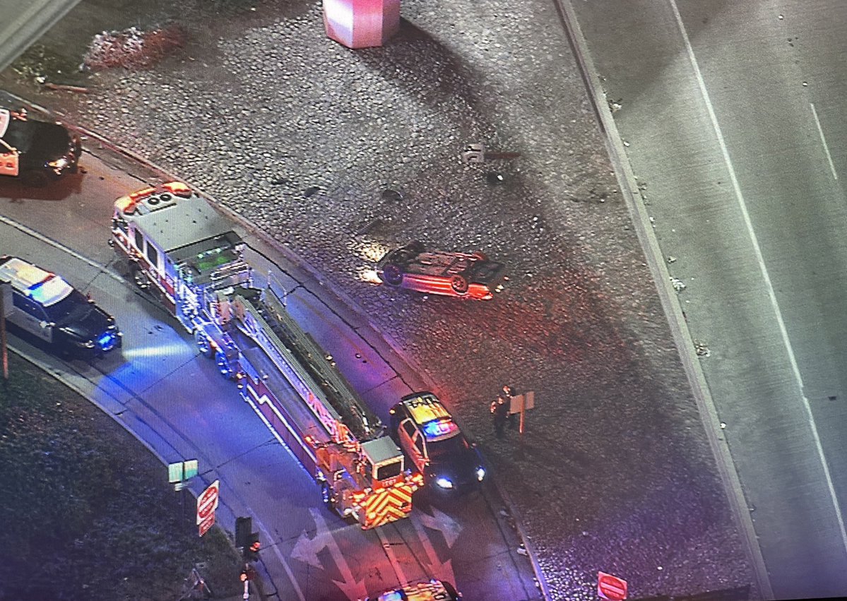 A short pursuit ends in a crash in Anaheim. Started in Santa Ana before the robbery suspect flipped the car over on the 5 North Magnolia offramp. 3 in custody, police still looking for another