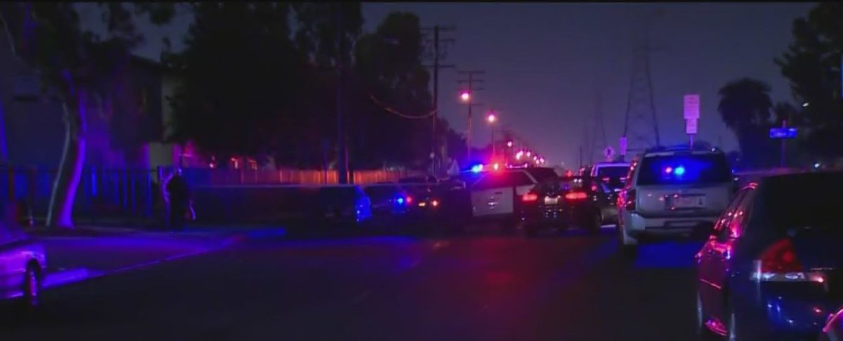 A man was shot and killed in Compton last night, and his stepfather has been arrested in the slaying. The victim was found lying in the street outside his parents' home