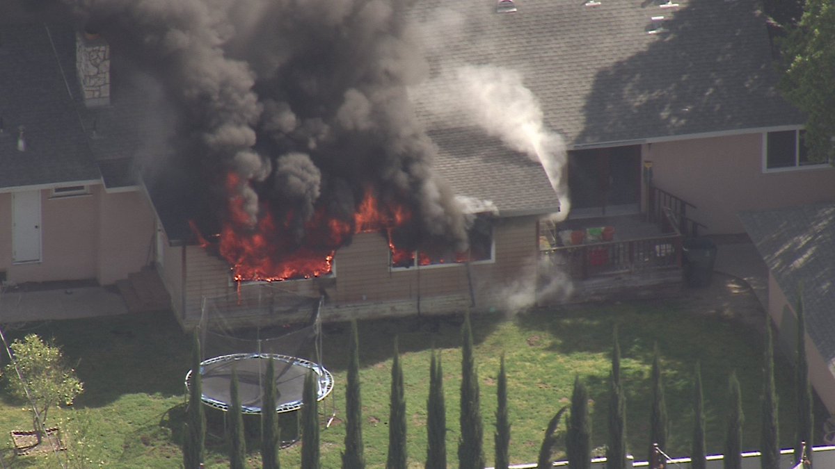 Pasadena House Fire. On Vista Lagoona Verdugo Fire arrived to residents using garden hoses on  flames coming out of the back part of a home. Quick work by firefighters saved property. No injuries at the time