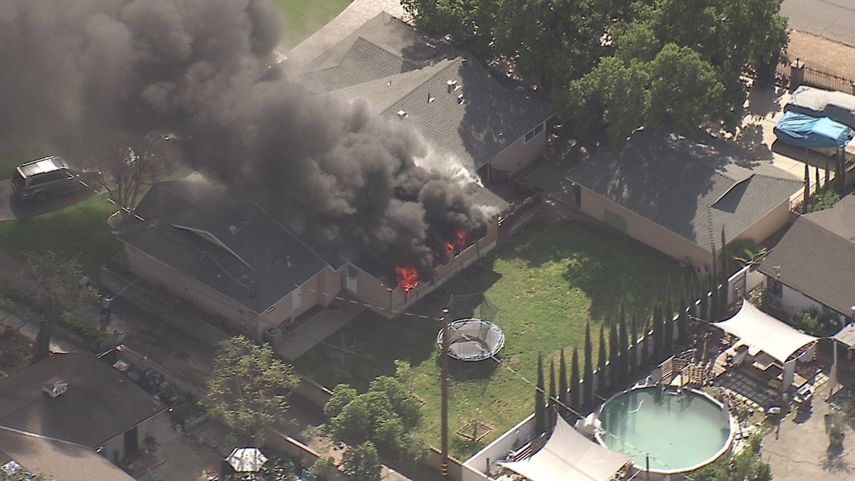 Pasadena House Fire. On Vista Lagoona Verdugo Fire arrived to residents using garden hoses on  flames coming out of the back part of a home. Quick work by firefighters saved property. No injuries at the time 