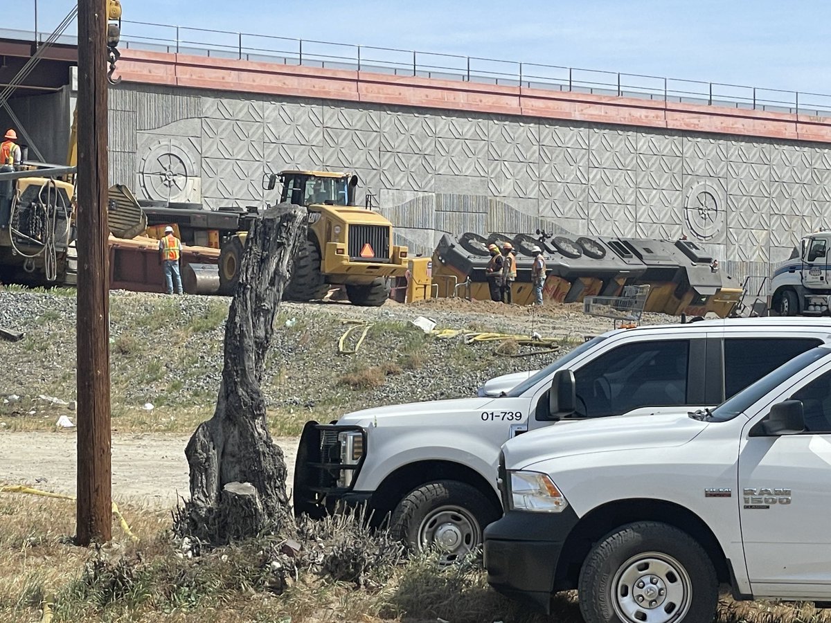 A freight train carrying lumber derailed in Colton this morning; 13 cars derailed. There is a small diesel spill that is being cleaned up. One moderate injury reported involving one of the cleanup workers