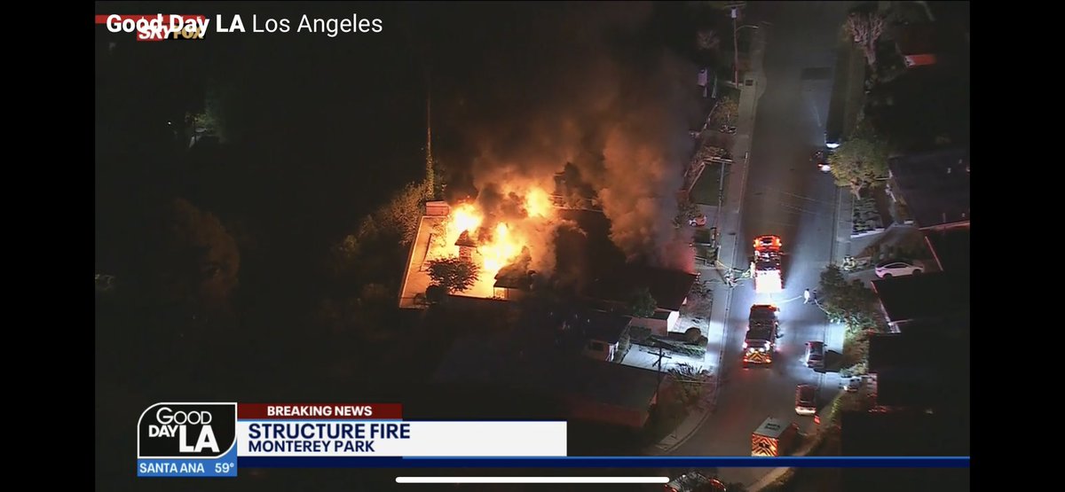 House on fire on Pelon Way in Monterey Park. At least two occupants appear to be out safely