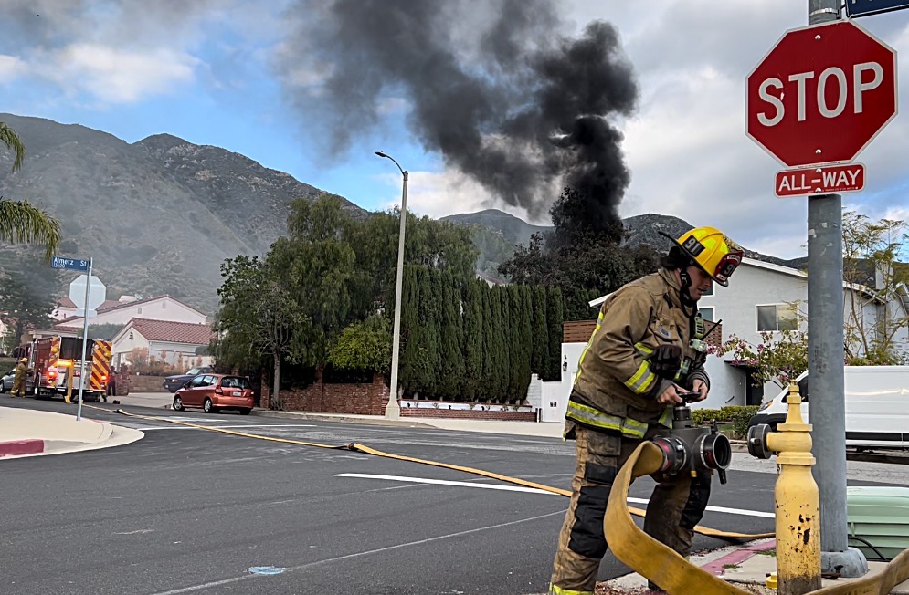 LAFD brings water to the fire. Not every hydrant is the same & FFs bring fittings &amp; tools necessary to adapt. As the supply line is being connected to the hydrant, FFs are developing hand lines to the front door.