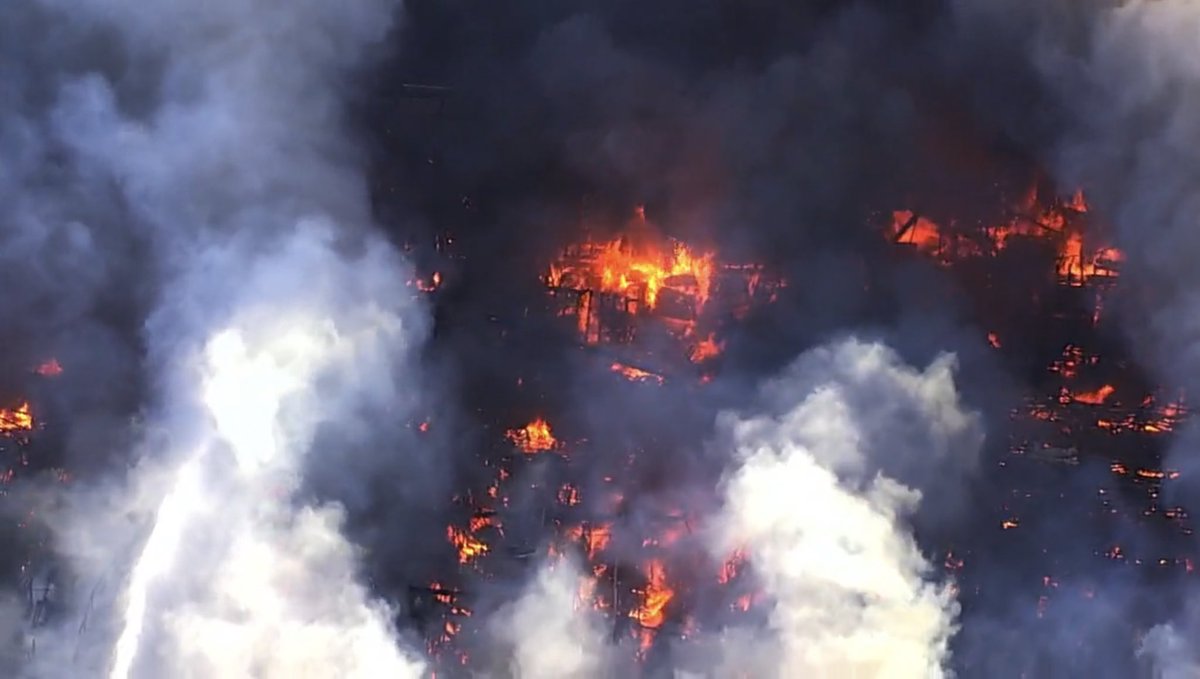 high above the smoke billowing out of the Home Depot on Blossom Hill Rd. in South San Jose.