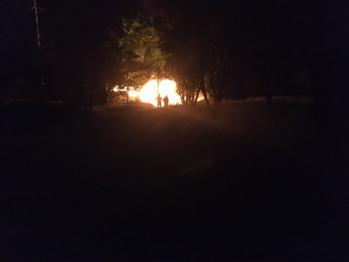 Butte County Firefighters are at scene of a fully involved wooden train trestle in South Chico near Estes Rd. Approximately 30 feet of trestle have been severely damaged halting train traffic for undermined amount of time. Fire is currently under investigation