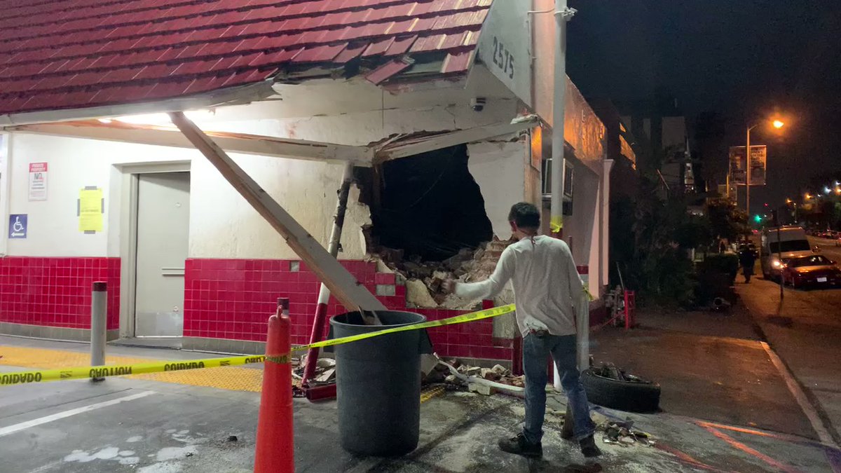 A driver flew his car into the og Original Tommy Burger's at Rampart & Beverly and left this massive hole