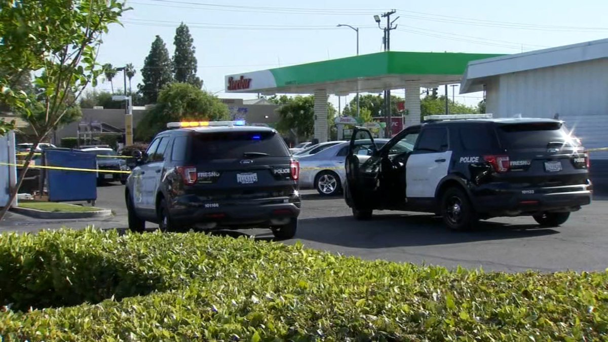 Police are investigating a suspicious death after a man's body was found in a car at a northeast Fresno gas station