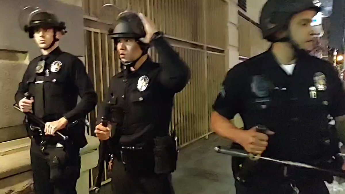 An LAPD officer tells that an unlawful assembly has not been declared in Downtown Los Angeles for the pro-choice protest