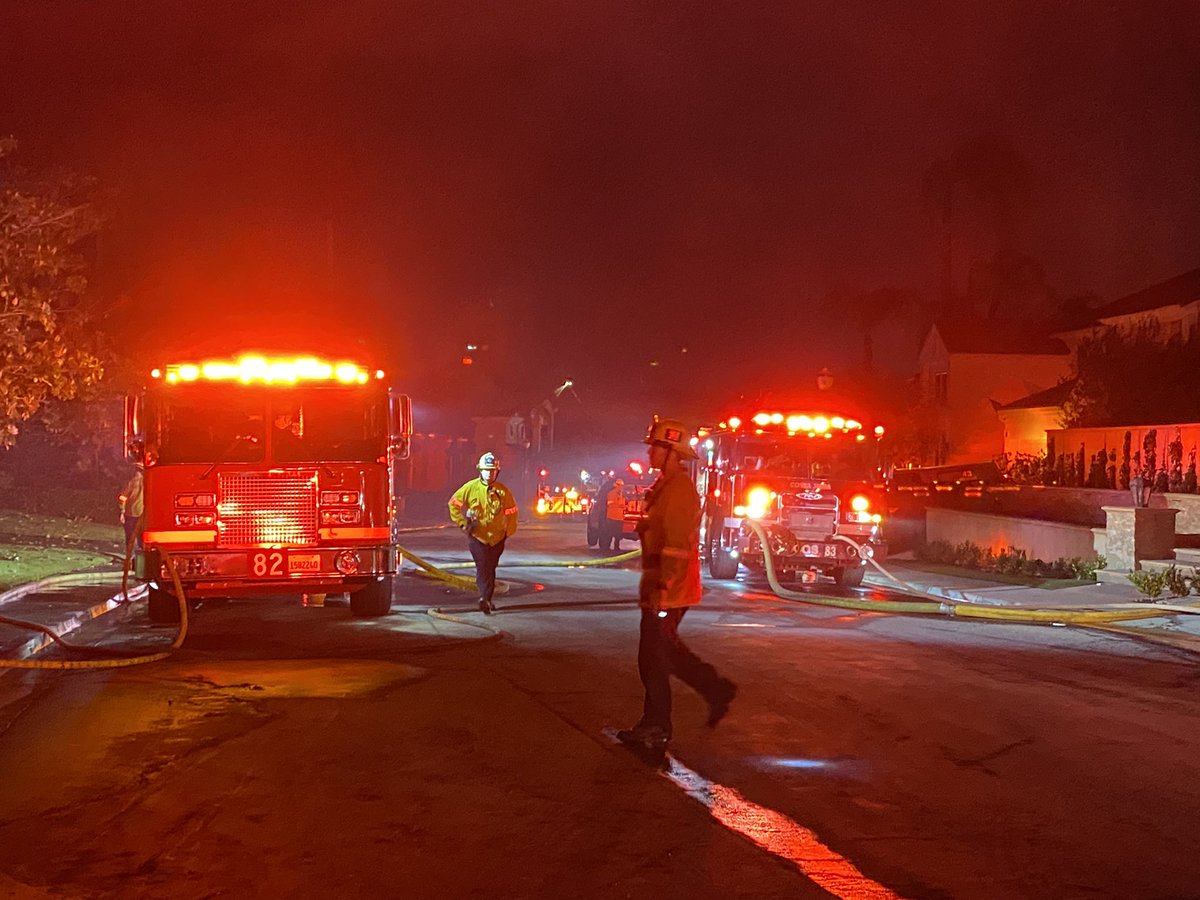 Hotspots at homes in Orange Co. California neighborhood of Coronado Pointe in Laguna Niguel still popping up. Fire crews will be here throughout the night trying to make sure flames don't spread to other homes on the block. 