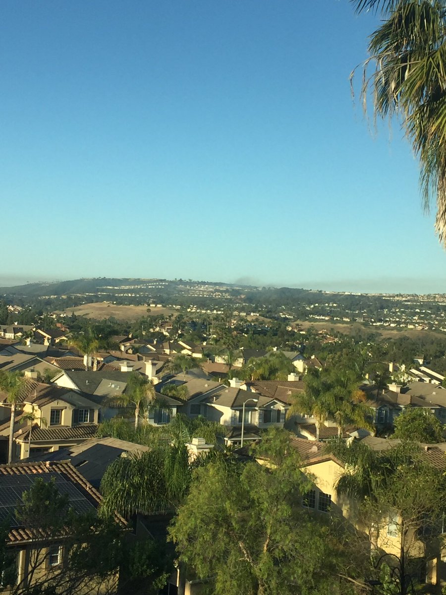 CoastalFire Latest  Photos 14 hours apart, taken from my parents' place in Laguna Niguel   8:30AM we're expecting our next news conference with an updated containment number.  