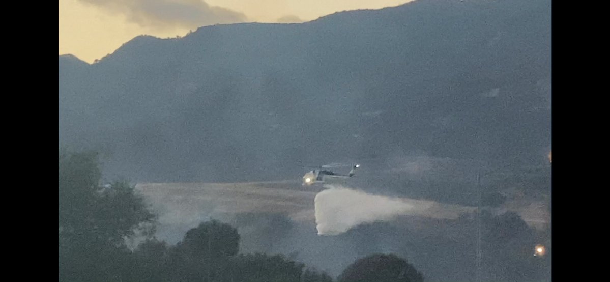 Santa Barbara  County FIREHAWK 964 released after aggressive attack on the Bridge fire - Hwy  154 above Santa Barbara in light grass and light to moderate wind.  No structures lost.  Cause under investigation.  This was near the Bridge to Nowhere