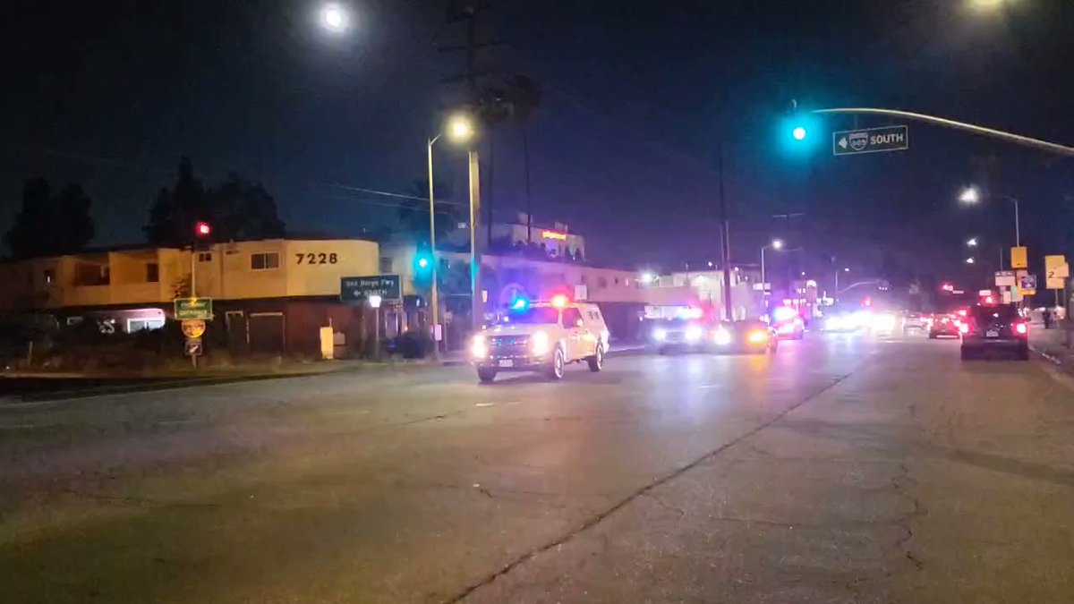 Haskell at the 405 South offramp in Van Nuys, where police were searching for a suspect in the shooting of a CHP officer in Valley Village. Residents seen leaving the taped off areasaid police told them there may shooter in the area and they had to leave