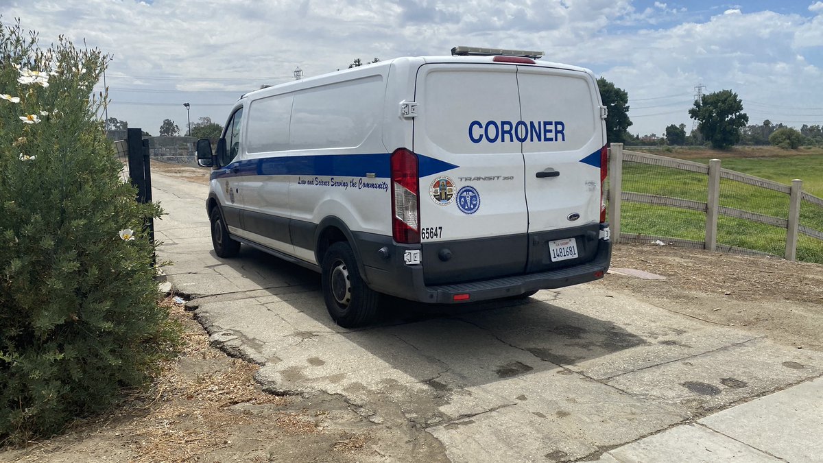 The coroner's office just arrived at the scene where a woman is believed to have been killed by a lightning strike in Pico Rivera